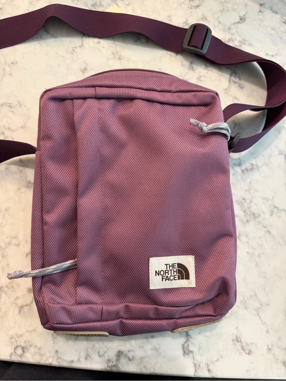 The North Face Berkeley Cross Body Bag in light purple